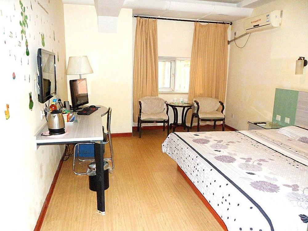 Jinkailai Business Hotel Qingdao Beer Street Eksteriør billede